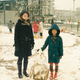 Illustration for article titled Time traveling photographer adds herself into her childhood pictures